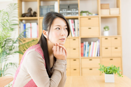 Beautiful asian woman relaxing in the room